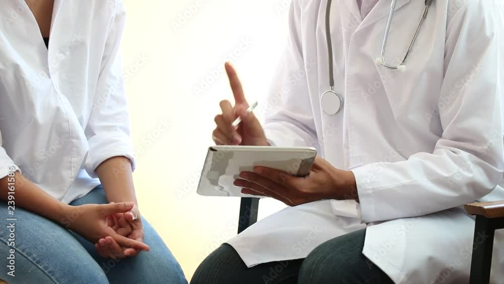 Healthcare medical concept : Doctor / psychiatrist consulting gynecological female illness, writing prescription clipboard record information,patient listening receiving in medical clinic hospital. Healthcare medical concept : Doctor / psychiatrist consulting gynecological female illness, writing prescription clipboard record information,patient listening receiving in medical clinic hospital.