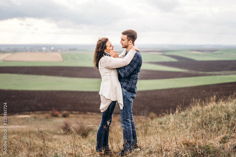 Romantic pretty couple outdoor enjoy spending time together. Romantic pretty couple outdoor enjoy spending time together.