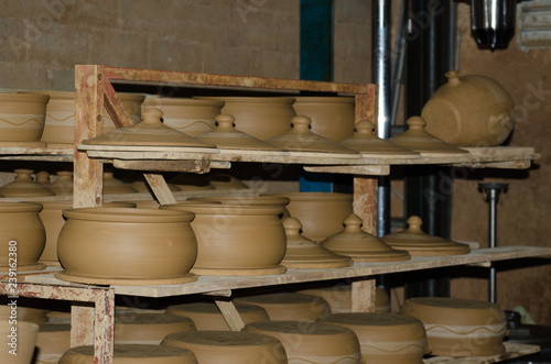 Pottery studio shelves storage clay cookware 