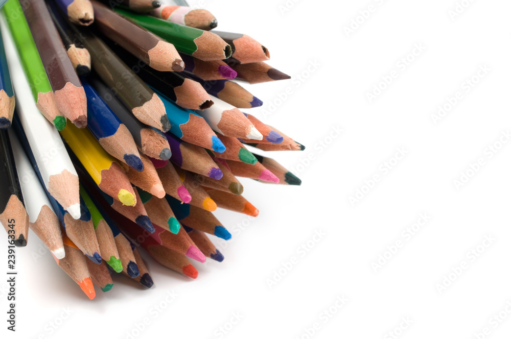 Bunch of colored pencils isolated on white background. Selective focus. Bunch of colored pencils isolated on white background. Selective focus.