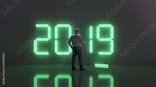 business man checks the time on the eve of the new 2019