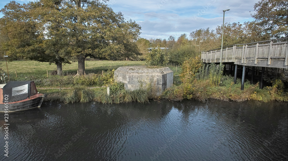 World War II pillbox next to a wooden bridge on the Kennet and Avon Canal