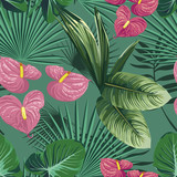 Green tropical leaves and flowers seamless pattern