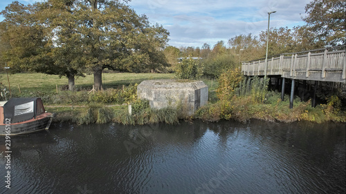 World War II pillbox next to a wooden bridge on the Kennet and Avon Canal