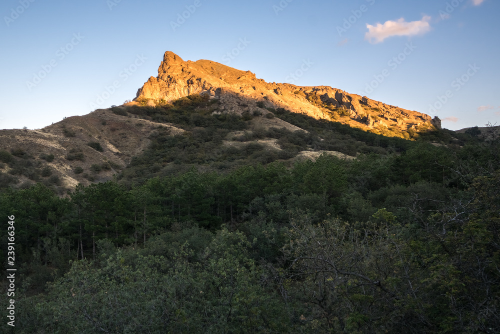 Rocks, illuminated by the setting sun, Karadag Reserve