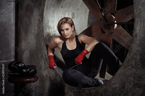 Sporting blonde woman in boxing bandages © svittlana