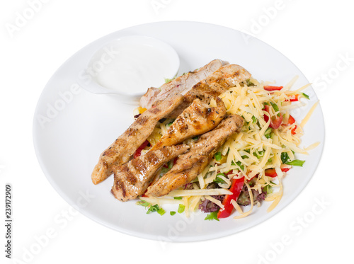 Delicious salad with cheese and chicken fillet.