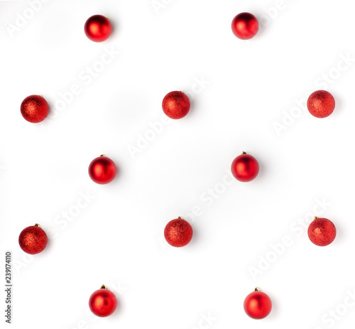 Christmas or winter composition. Pattern made of red balls on white background. Christmas, winter, new year concept. Flat lay, top view, copy space