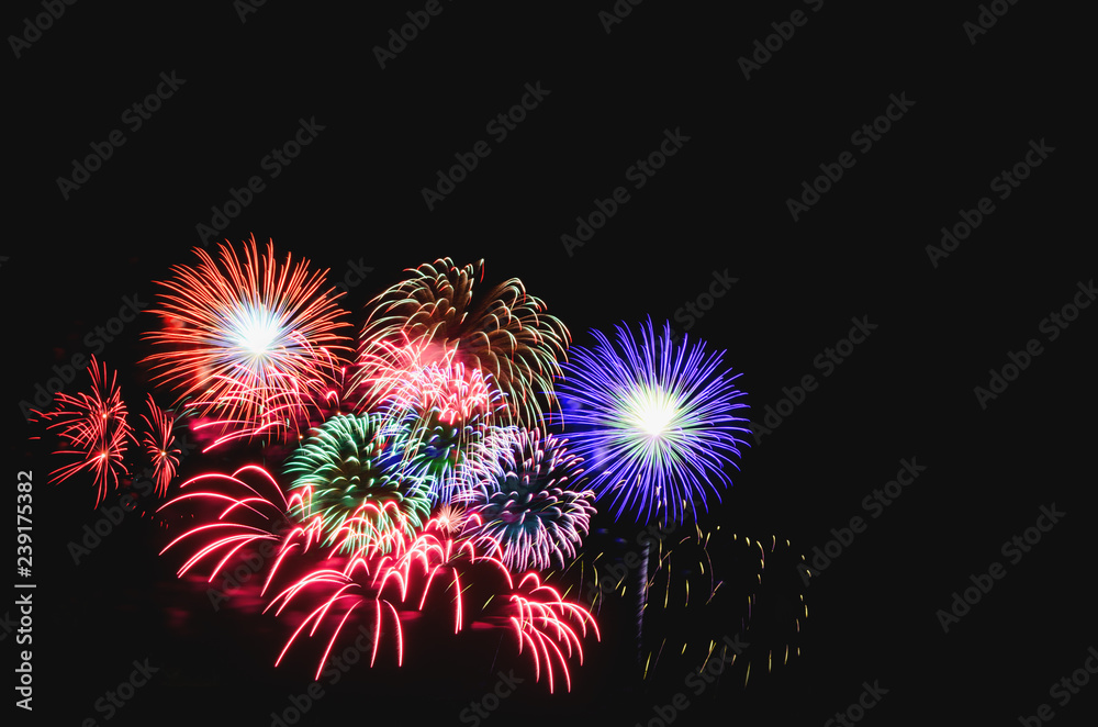 colorful fireworks abstract background in the dark sky with copy spacce for festival celebration holiday countdown to Happy New Year party.