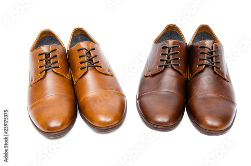 Brown shoes isolated on white background © Elnur