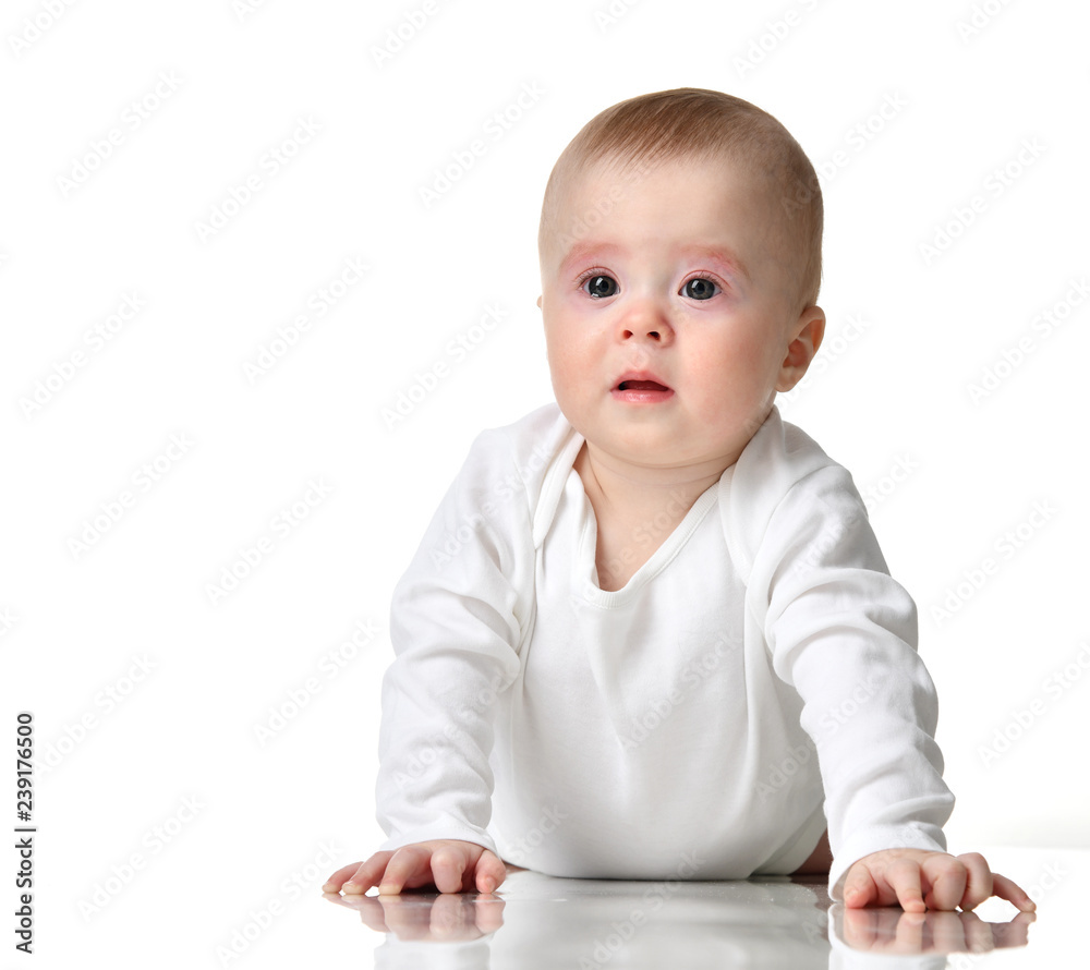 Infant child baby girl toddler upset crying in body shirt isolated on a white Infant child baby girl toddler upset crying in body shirt isolated on a white