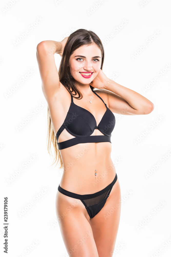 Portrait of happy beautiful fit woman in black bikini isolated on white background Portrait of happy beautiful fit woman in black bikini isolated on white background