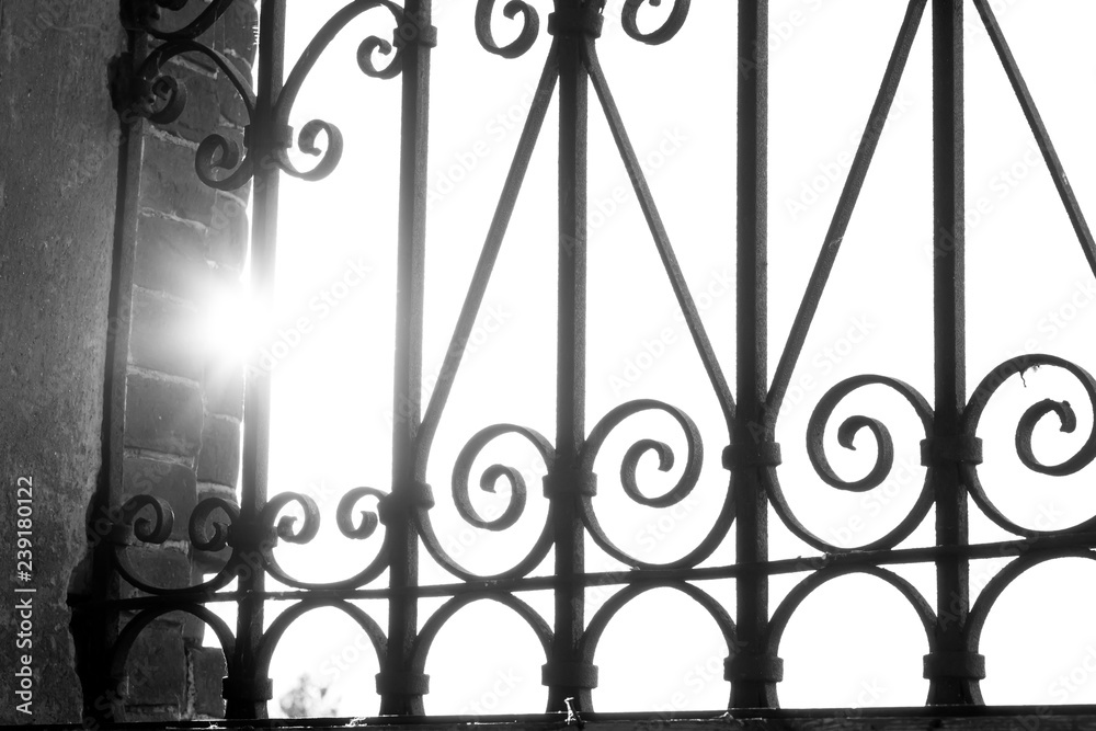 wrought iron bars on the windows in the old church wrought iron bars on the windows in the old church