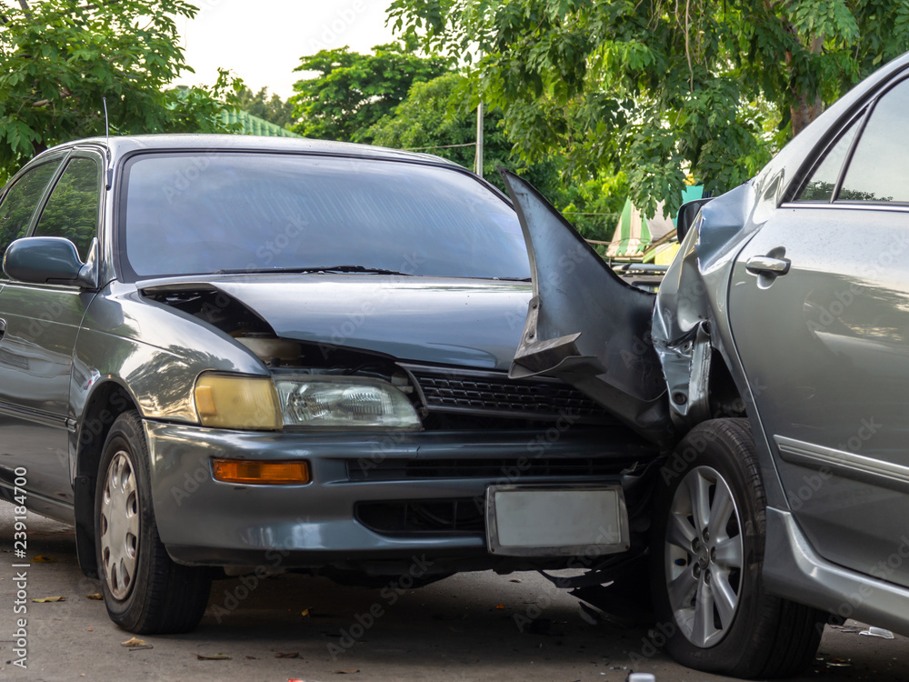 Car crash accident on street with wreck and damaged automobiles. Accident caused by negligence And lack of ability to drive. Due to illness Car crash accident on street with wreck and damaged automobiles. Accident caused by negligence And lack of ability to drive. Due to illness