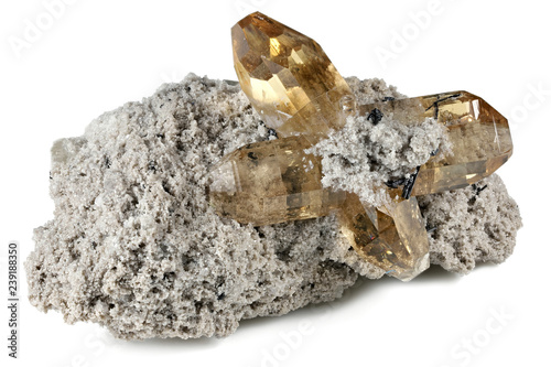 topaz on volcanic rhyolite matrix from Thomas Range, Utah isolated on white background photo