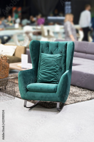 Soft, comfortable, fashionable, rocking, green chair © Olha