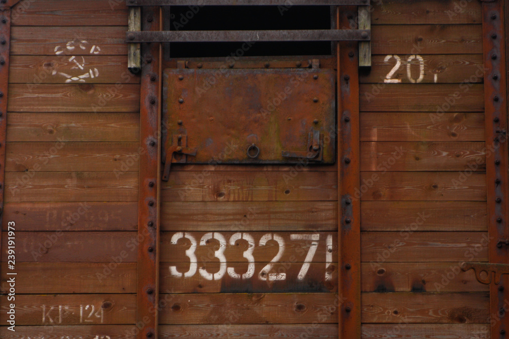 Old wood train number sign with details. Old wood train number sign with details.