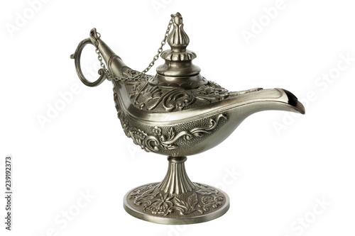Oil lamp in oriental style made of metal with krsivym bas-relief on a white background.