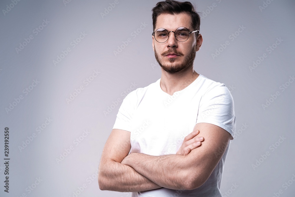 Handsome young guy posing in studio - isolated Handsome young guy posing in studio - isolated