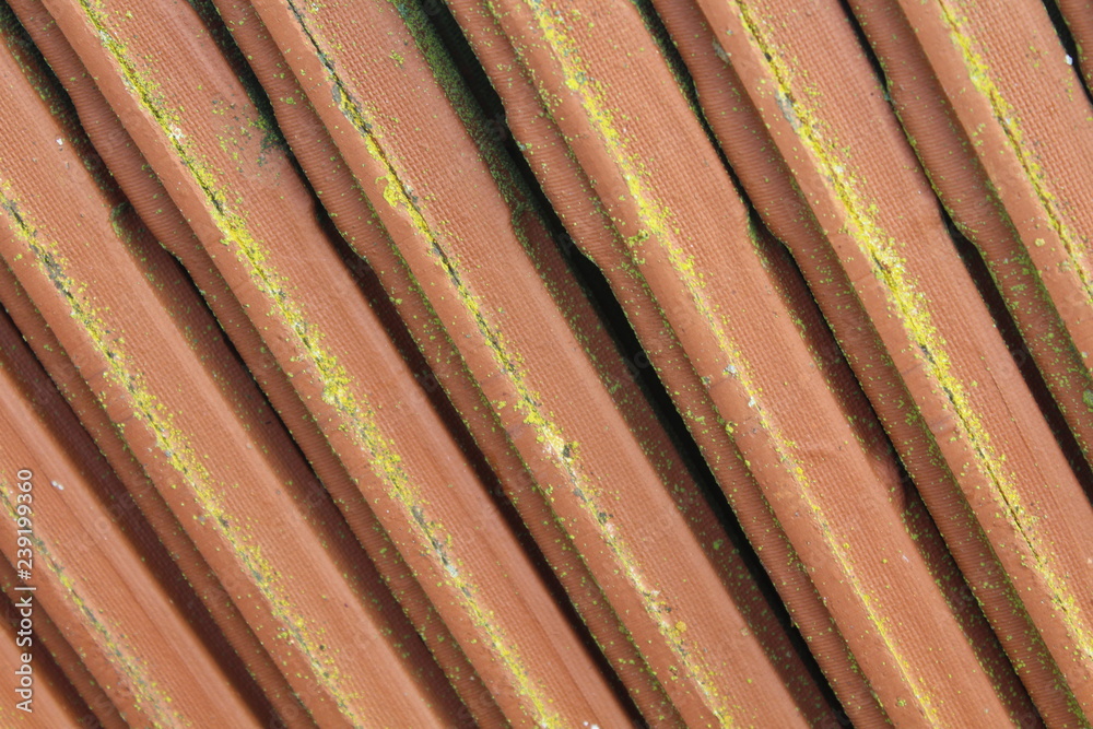 Stacked tiles before being placed in the roof Stacked tiles before being placed in the roof