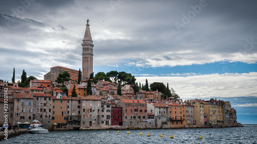 Panoramic view of Rovinj old town seaside facade, harbour in rainy day