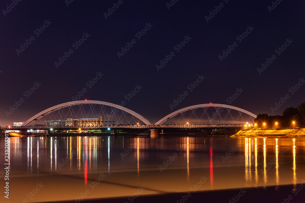 Fototapeta premium Novi Sad, Serbia May 26, 2018: Zezelj bridge over Danube in Novi Sad by night