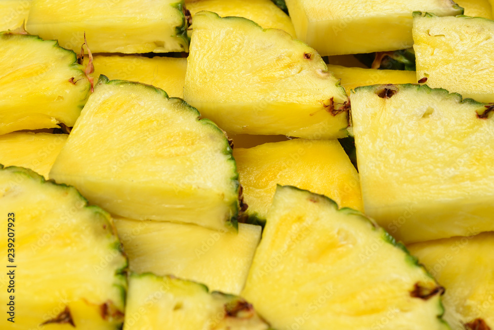 Pineapple juicy yellow slices background. Top view. Pineapple juicy yellow slices background. Top view.