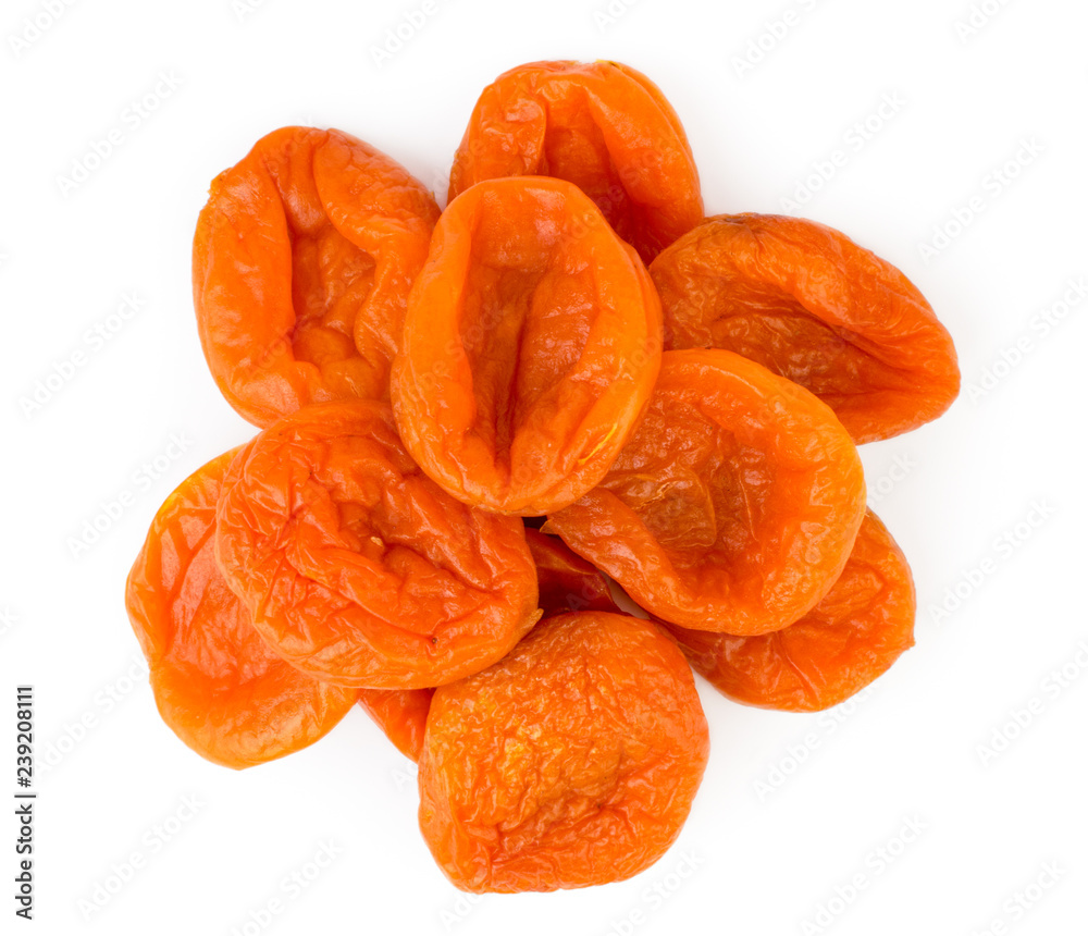A bunch of dried apricots on a white, isolated. The view from the top. A bunch of dried apricots on a white, isolated. The view from the top.