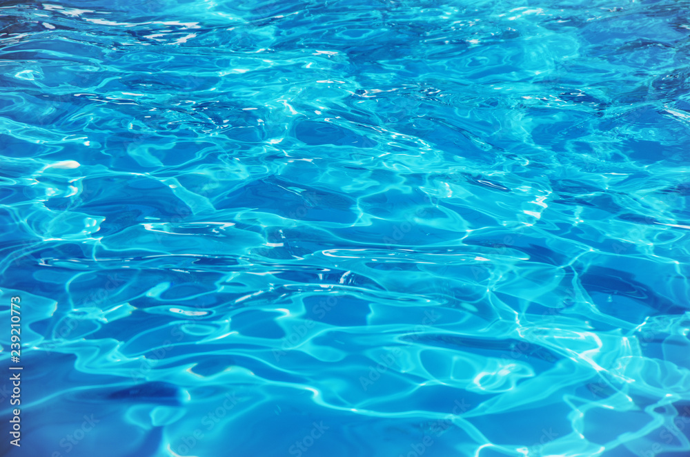 water in swimming pool rippled water detail background