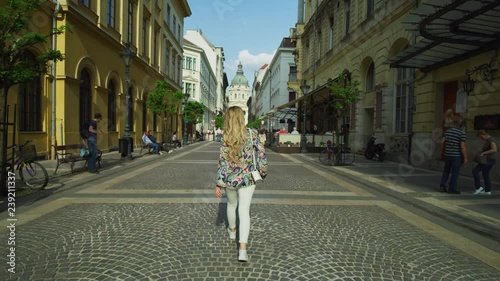 Woman walking on Zrinyi street
