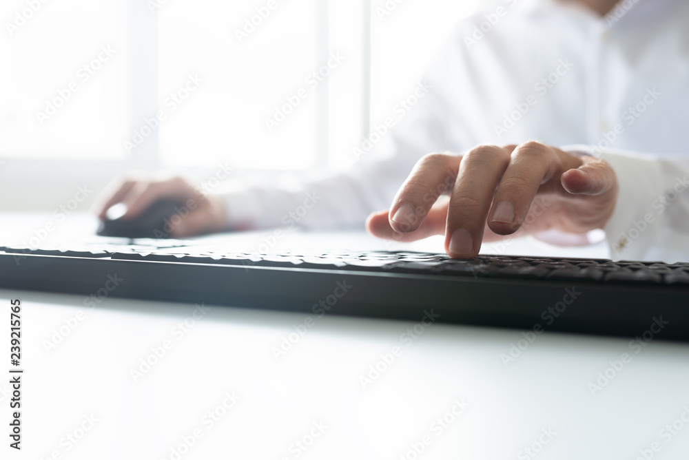Low angle view of business programmer working Low angle view of business programmer working