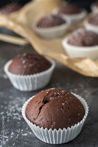 Sweet chocolate muffins with pieces of chocolate.