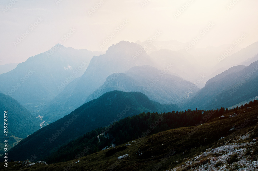 Naklejka premium Mountain landscape with Mangart mountain in Julian Alps on the border between Italy and Slovenia