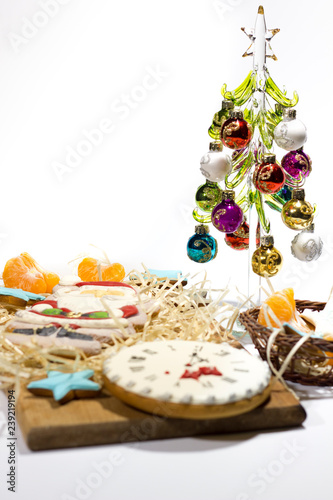 Fototapeta Naklejka Na Ścianę i Meble -  Santa Claus christmas gingerbread with mandarin