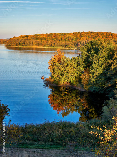 Fototapeta Naklejka Na Ścianę i Meble -  View of the Schwerin lake with a small boat.