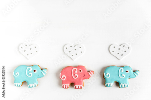 Frame for the design of a baby banner, greeting card. Background for baby banner. Children banner with elephants. Base for banner with gingerbread-elephants