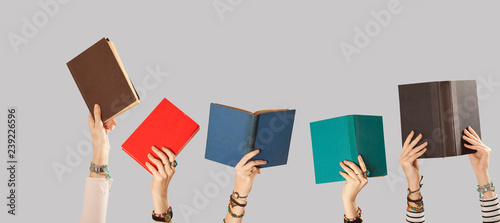arm raised books 