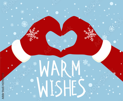 Santa's hands making a heart sign. Chrismas greeting card