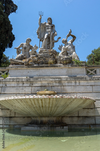 Amazing view to Fountain of Neptune at Piazza del Popolo in city of Rome, Italy