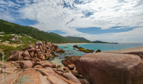 Rocky coast at Galheta's Beach, nudist point in Florianopolis, Brazil photo