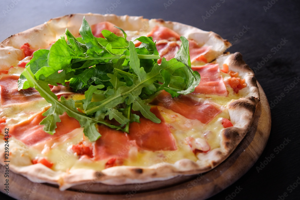 lavender flower. flowSliced pizza with prosciutto (parma ham), arugula (salad rocket) and parmesan on dark wooden background top view. Italian cuisine. Space for text.er garden. Soft focus lavender flower. flowSliced pizza with prosciutto (parma ham), arugula (salad rocket) and parmesan on dark wooden background top view. Italian cuisine. Space for text.er garden. Soft focus