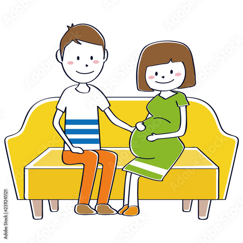 おかっぱの妊婦を気遣う旦那さん　ソファに座っている