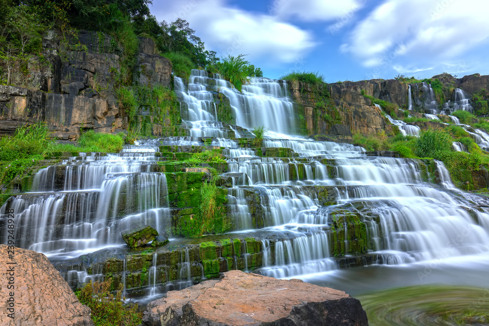 Mystical waterfall in the Da Lat plateau, Vietnam. This is known as the first Southeast Asian waterfall in the wild beauty attracted many tourists to visit