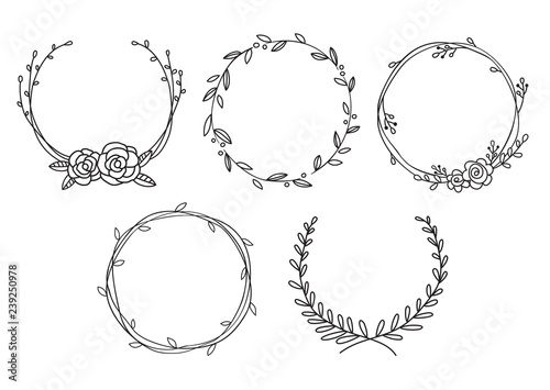 Vector illustration of hand drawn wreaths. Cute doodle floral wreath frame set. photo