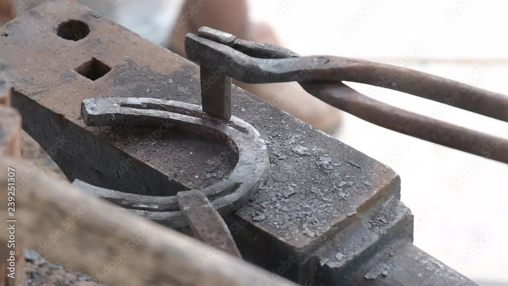 blacksmith makes horseshoe by tools blacksmith makes horseshoe by tools