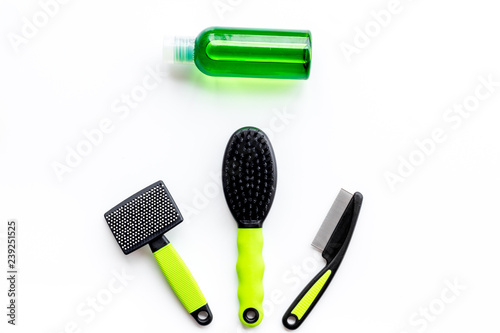 care about pet with brushes and grooming equipment white background top view mockup