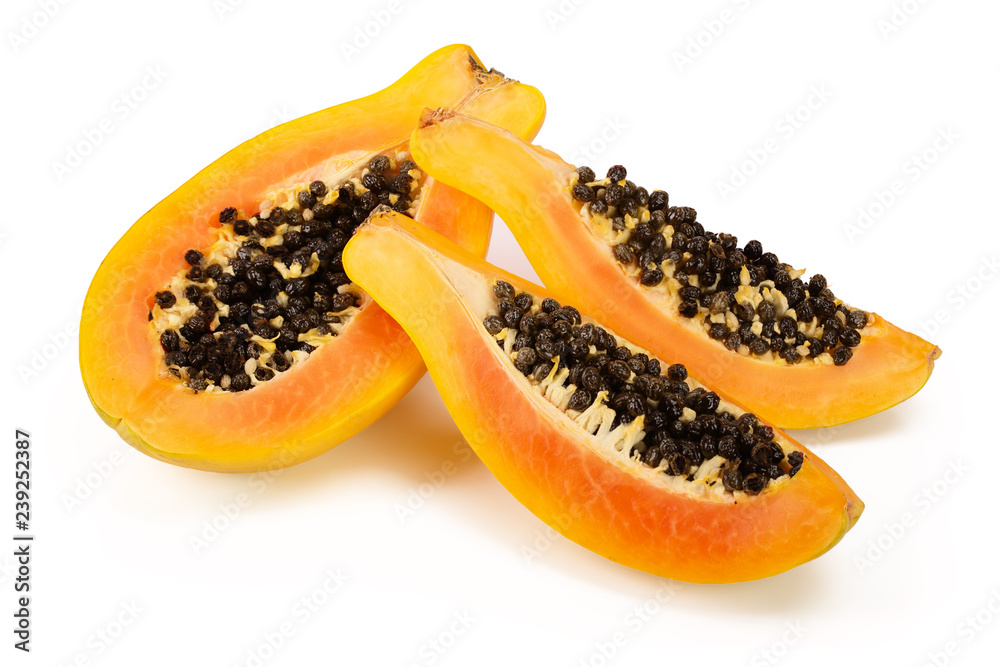 half of ripe papaya isolated on a white background half of ripe papaya isolated on a white background
