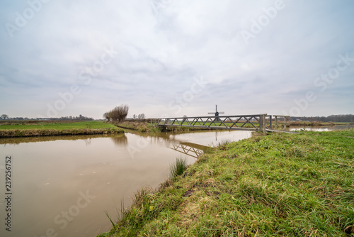 Wallpaper Mural bridge whit Zandwijkse Widmill in Uppel Torontodigital.ca