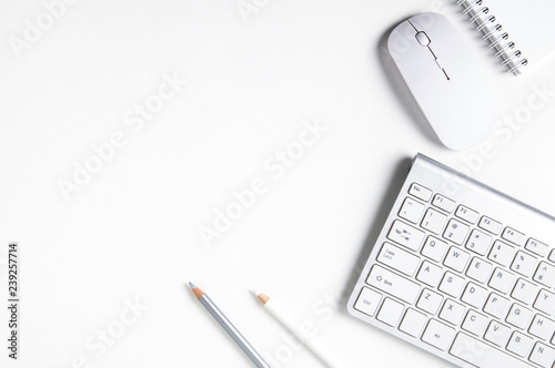 White computer mouse and keyboard on white background
