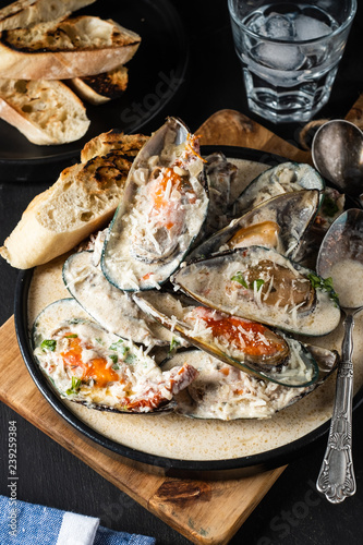 Mussels with Blue Cheese Sauce and Garlic Baguette.